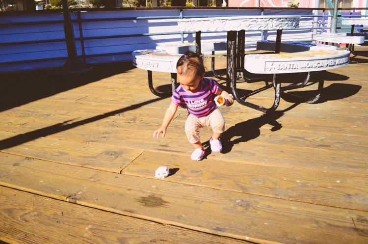 Santa Monica Pier with my baby girl baby eating ice cream