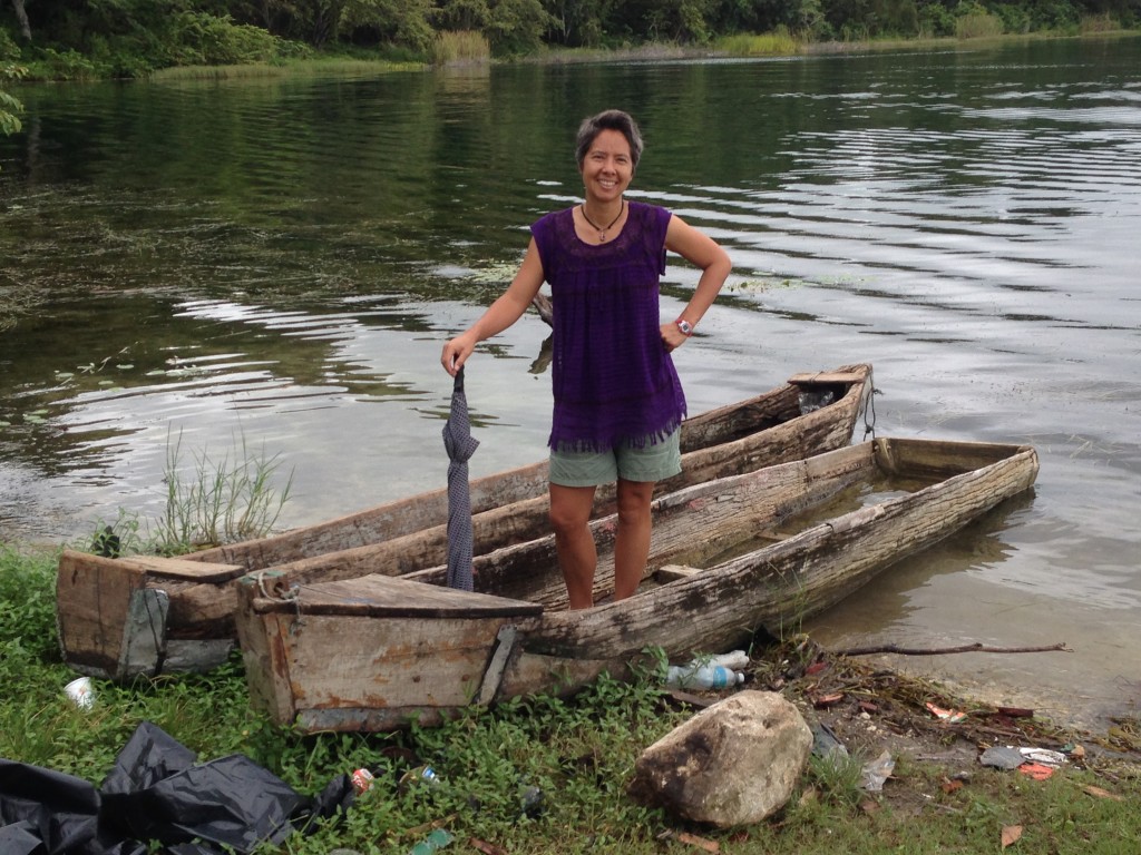 R hamming it up on Lago de Peten Itza. Most of the boats we rented were sturdier than this piece of log.