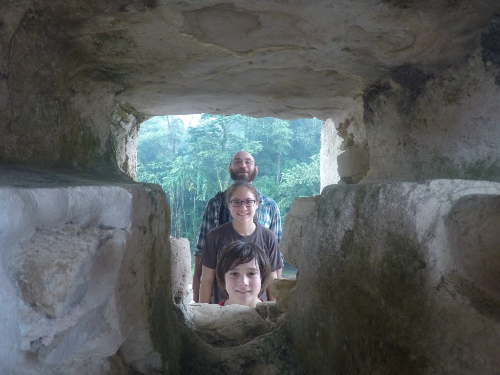 One of the lighter moments while we waited out the rain atop the Palace at Palenque.