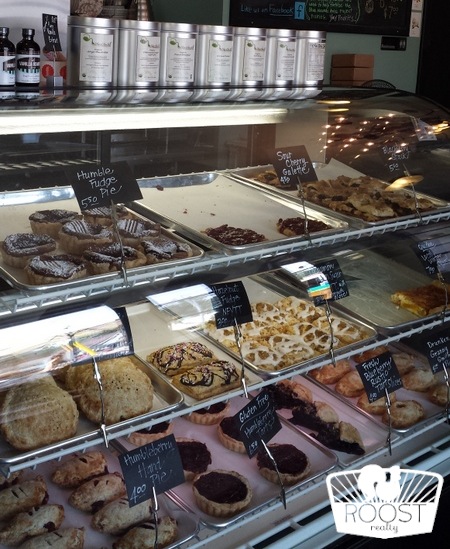 Inside Humble Pie with a display case full of delicious bakery items.