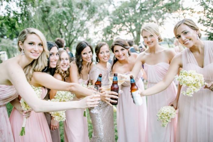 bridesmaid love at our lemon & lime clients wedding. Photo by L. Hewitt Photography 