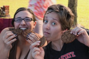sisters enjoying gingersnap cookies