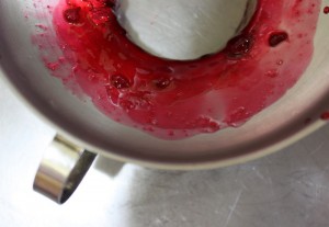 sour cherry jam on funnel