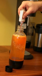 adding flavoring to soda stream water
