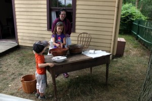 washing dishes in outdoor kitchen