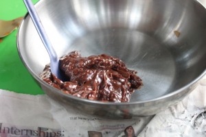 camp chocolate pudding on metal bowl with spork