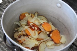 potatos and onions cooked in a foil packet