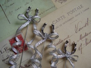 Three fine silver horse-shoe accents for J's bouquet