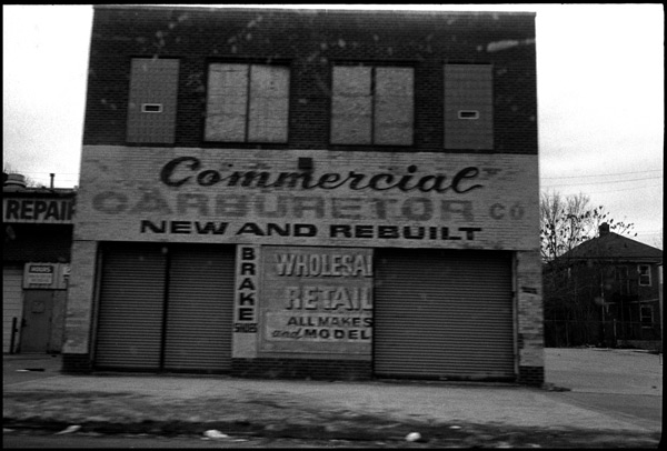 black and white photograph: commercial carburetor, detroit, michigan