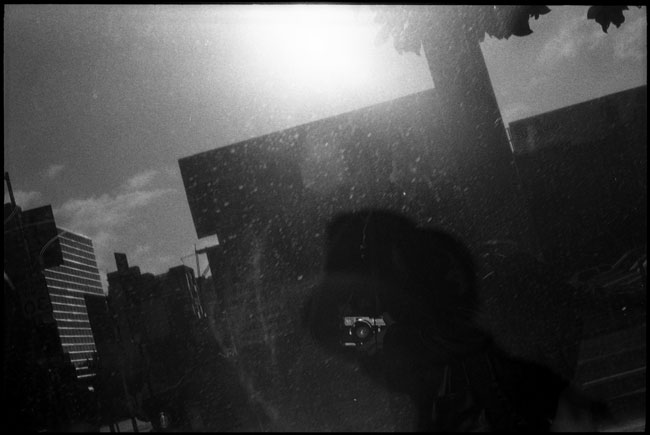 Black and White Photograph: Self Portrait in Window