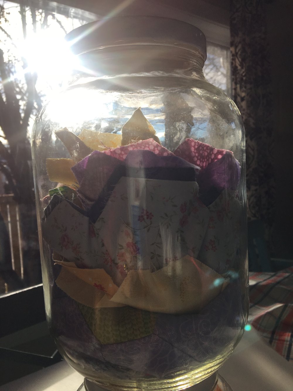 This was one of my grandma's jars. She died when I was 7. She was an extremely talented seamstress and quilter, basically a fabric magician. She is one of the reasons I started to sew when I was 10. I feel connected to her when I create with fabric.