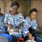 Ivorian widows run a small restaurant in Yopougon, Côte d'Ivoire. UN Photo / Eric Kanalstein