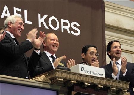 Ryzenberg On: Mr. Kors Goes to Wall Street New York&#8217;s Stock Exchange just got a little glitzier. Legendary American brand Michael Kors occupied the NYSE trading floor Thursday morning and made a strong ca-ching sound &#8212; of $20 a share. The company&#8217;s initial public offering raised $944 million in Hong Kong on Wednesday, valuing the company at $3.8B, according to the Financial Times. In fact, the opening surpassed analysts expectations and even closed the day at $24.20, which values the company at $4.62B. Kors (NYSE: KORS.N) had the biggest opening public offering in the history of US fashion; it even beat Ralph Lauren&#8217;s astounding initial IPO of $882M in 1997. The newlywed, Project Runway judge and designer is selling 5.6 million shares and will pocket a mere $116M. Now that&#8217;s some serious shekels! So here is the deal. This is absolutely a sign that the economy is slowly rebounding. Traders and analysts see the brand&#8217;s potential and the strong company as a reliable and  good buy. This shows how despite the current crisis, luxury brands, although not fully unaffected, are seeing signs of improvement. This year alone, Prada filed for an IPO in Hong Kong for $2.1B back in March and Salvatore Ferragamo also entered the trading circuit.  Currently, there are 169 Michael Kors retail stores in the US and 34 in Europe and Asia. They all showcase apparel, jewelry, accessories, footwear and watches. The company hopes to double its stores worldwide.  Now I guess 2011 is the year of Michael Kors! Mazal Tov and looking forward to celebrating and documenting more milestones. This leaves me wondering, who will be the next to jump on the bull? DVF perhaps. Ryzenberg On, is Signing Off PHOTO: Reuters