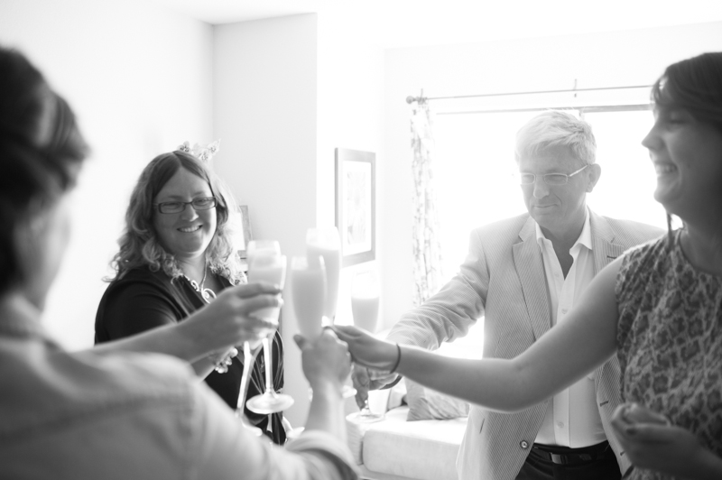 Family of bride toasting mimosas