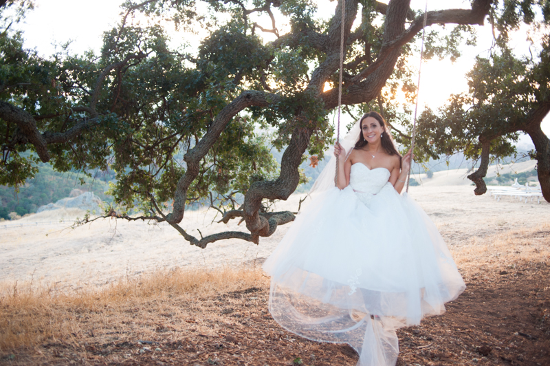 Bride sitting on swing at Diablo Ranch Events