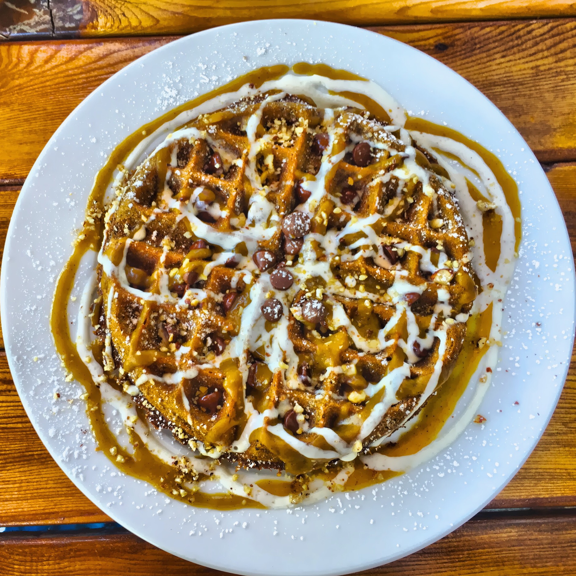 Pumpkin cheesecake waffle with hazelnuts and chocolate chips