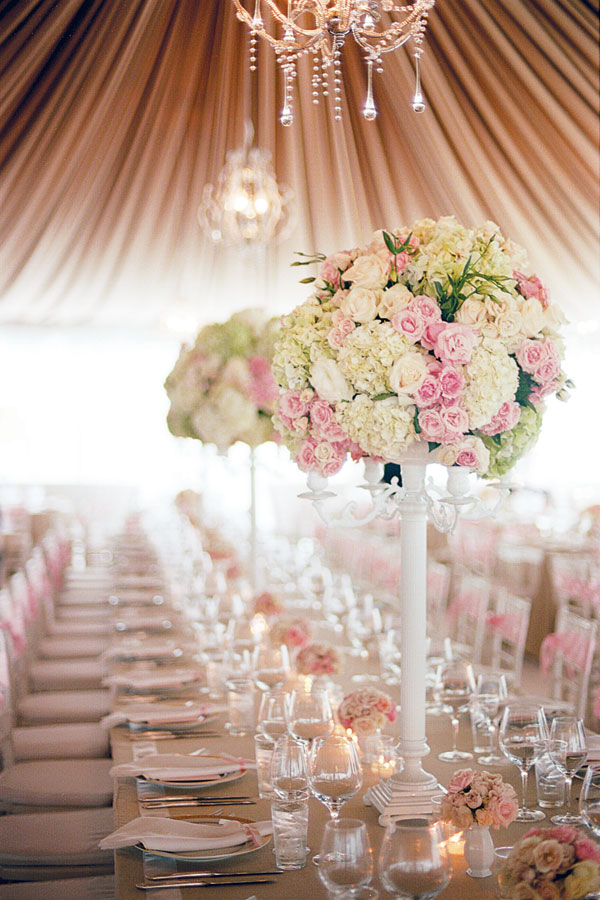 29 Tall Centerpieces That Will Take Your Reception Tables To New Heights Wedding Table Flowers Wedding Flower Arrangements Wedding Reception Centerpieces