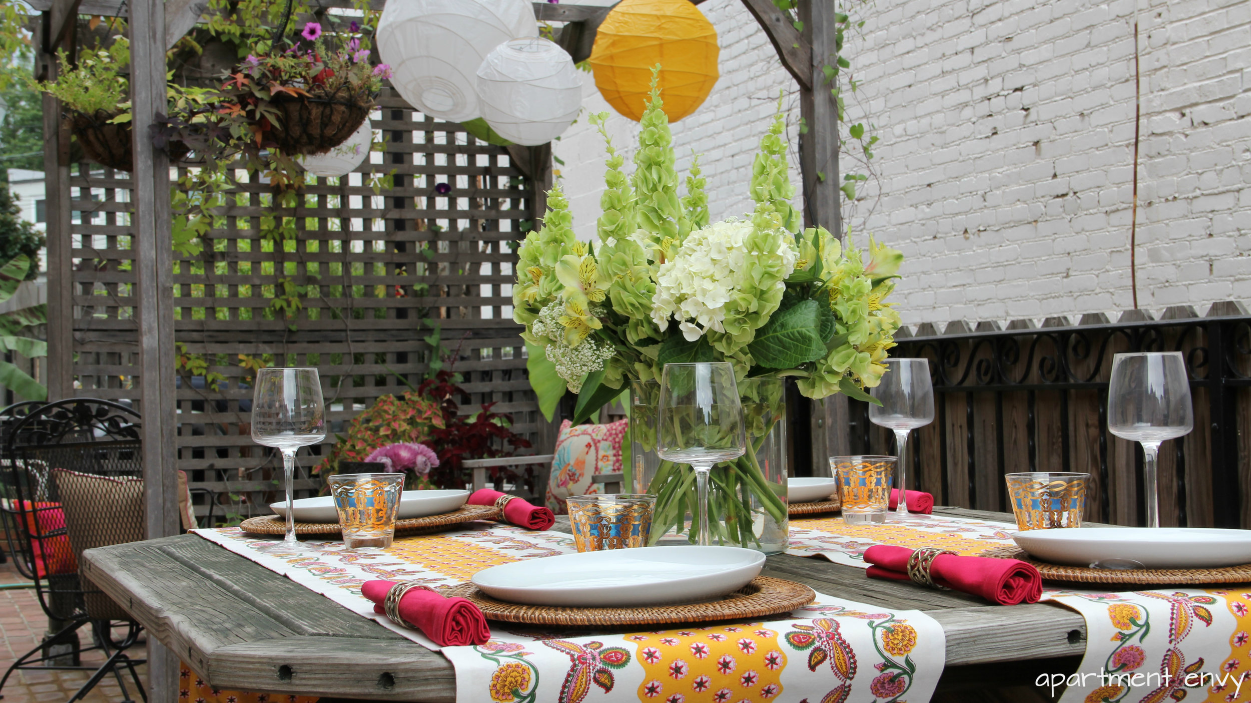 outdoor mexican theme girls night dinner party patio terrace brick deck patio laterns flowers interior design secor