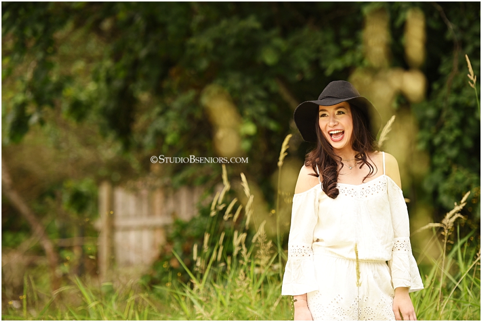 Studio B Portraits Senior Pictures with girl in lace romper and floppy hat at best senior pictures location in Issaquah near Bellevue WA