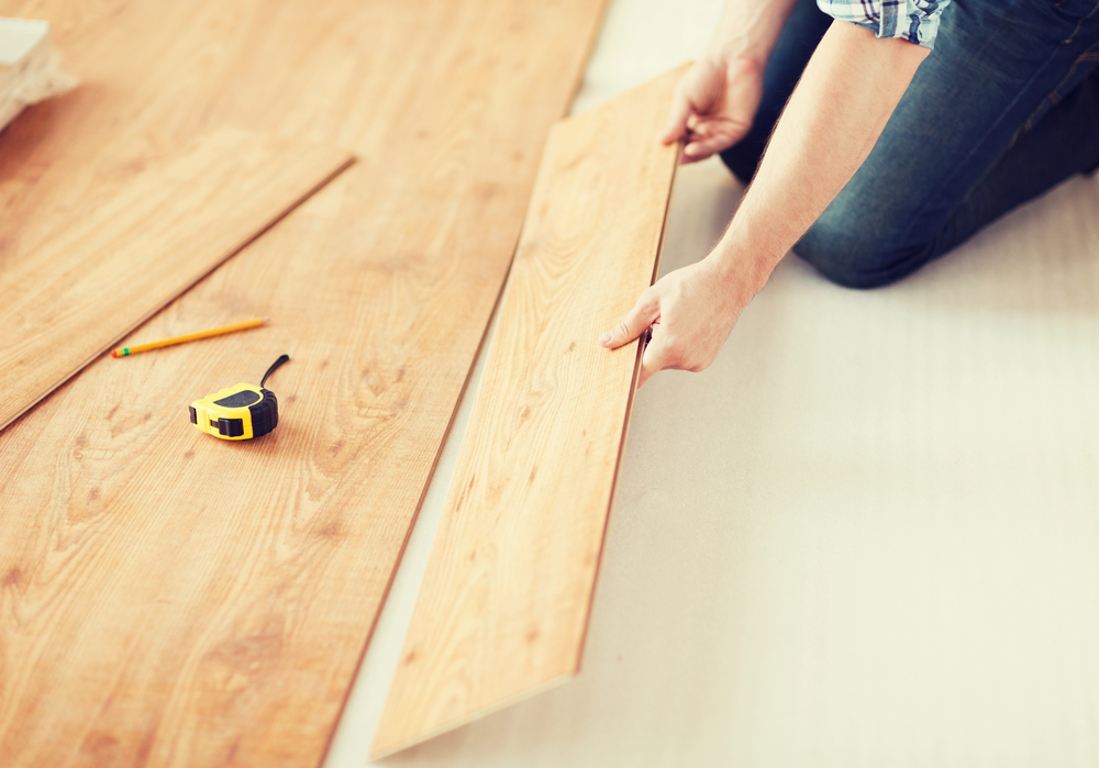 Wood flooring being installed in home.