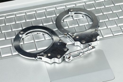 online crime with handcuffs