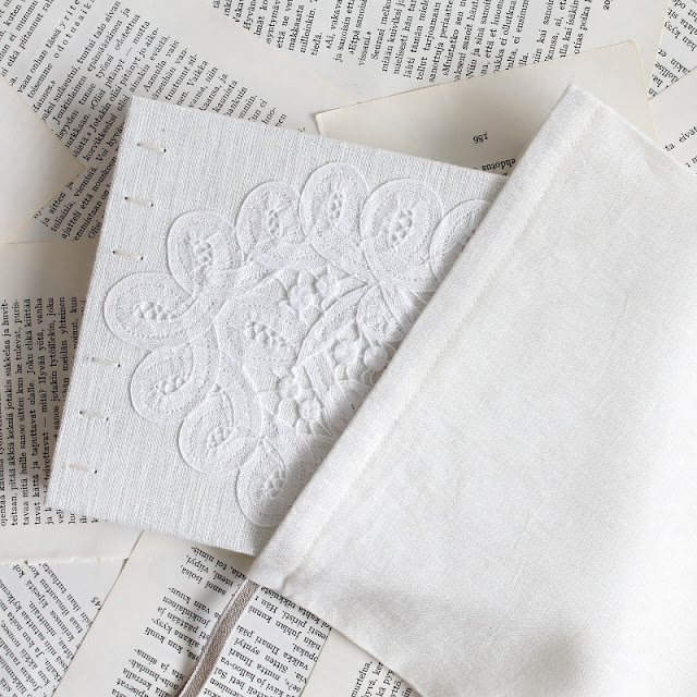 coptic bound guest book with vintage lace by Kaija Rantakari / paperiaarre.com
