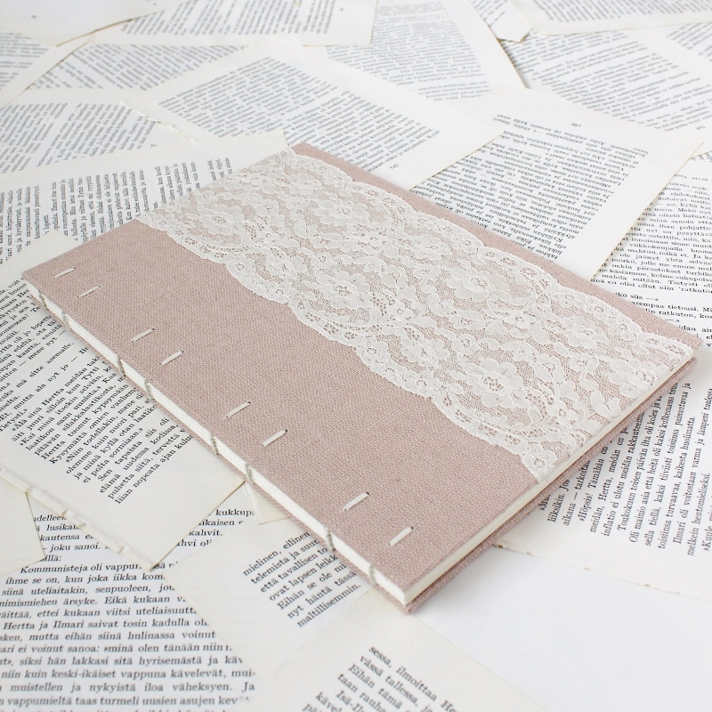Coptic bound guestbook with blush pink linen and floral vintage lace - handmade by Kaija Rantakari / www.paperiaarre.com
