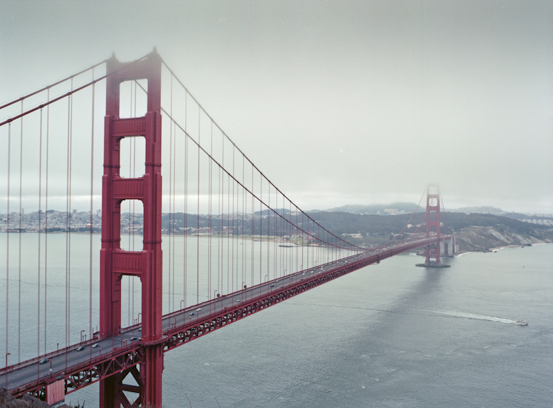 A photograph of the Golden Gate Bridge with the city of San Francisco in the background taken from the Marin Headlands