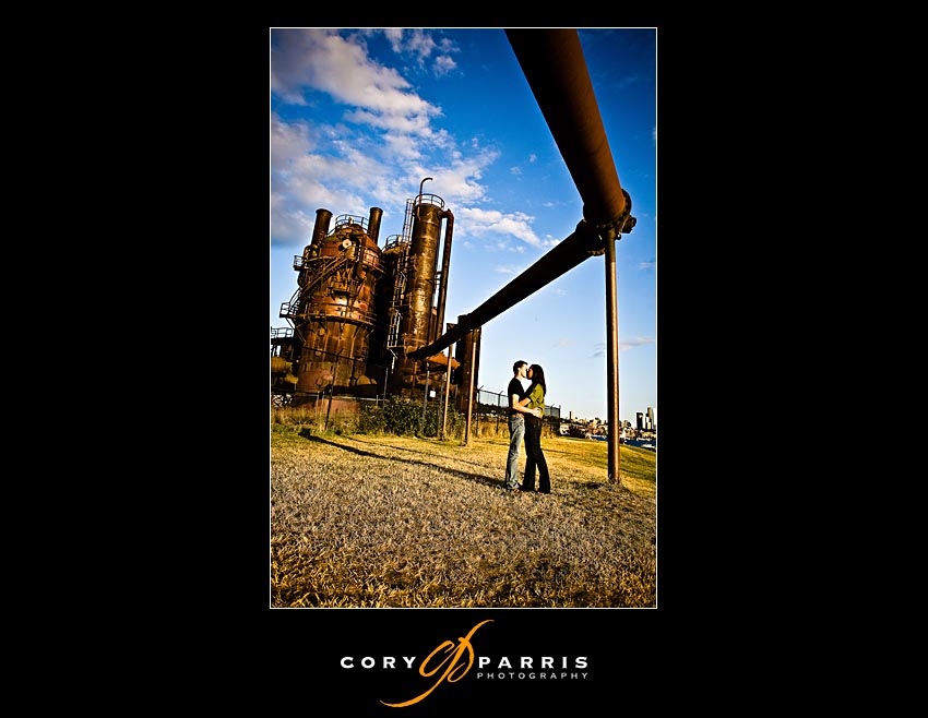 Couple portrait featuring the gasworks at gasworks park in seattle