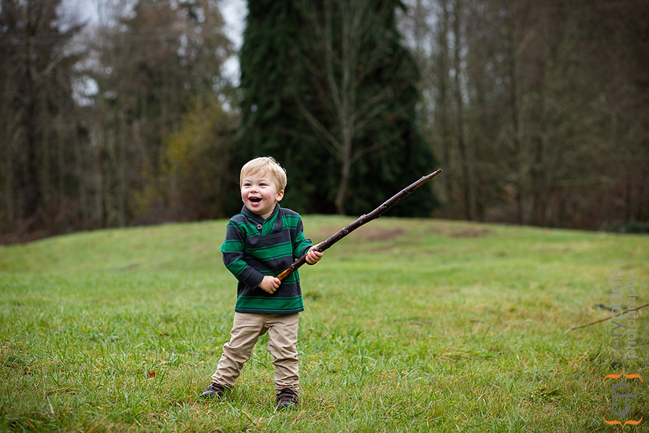 little boy with a stick