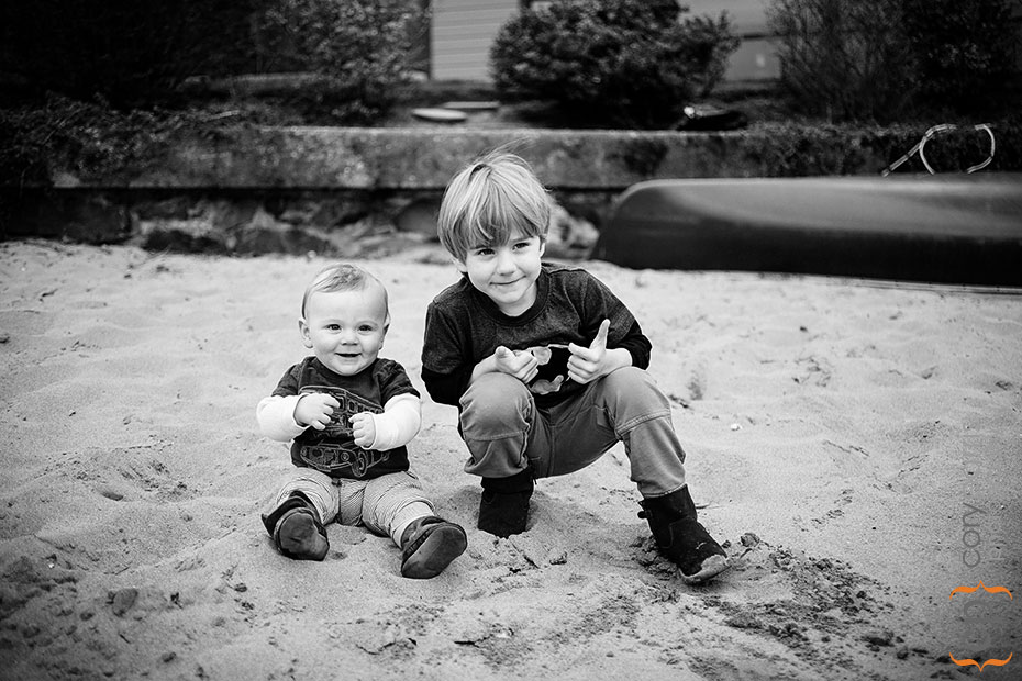 two little boys in the sand