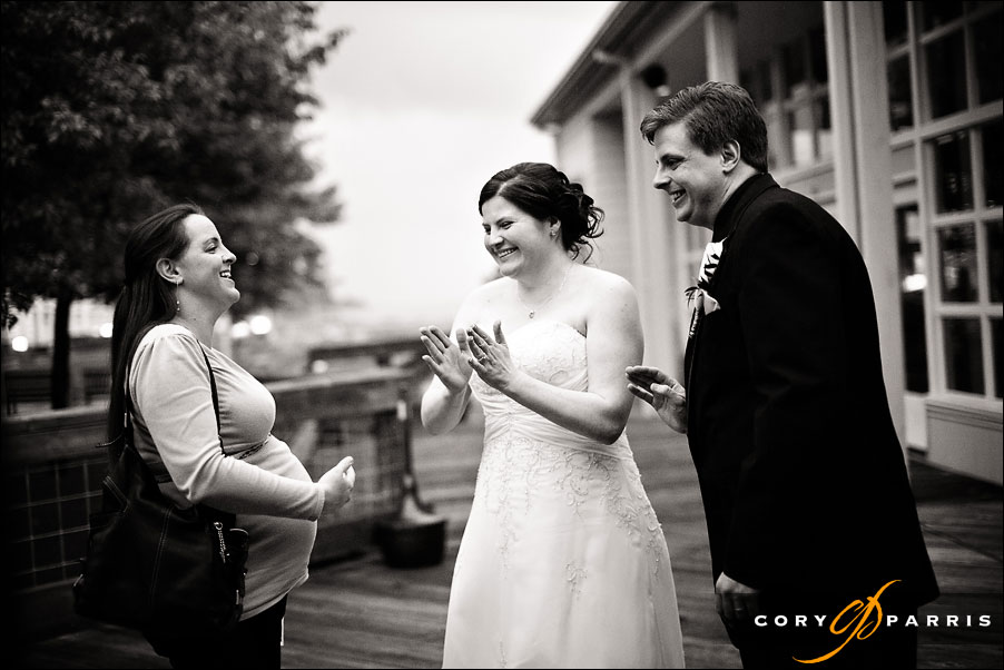 happy bride talking to a wedding guest