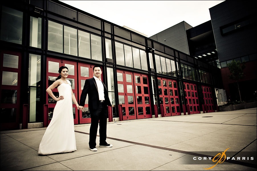wedding couple in front of the seattle fire station by seattle wedding photographer cory parris