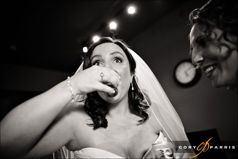 bride drinking tequila at willows lodge by woodinville wedding photographer cory parris