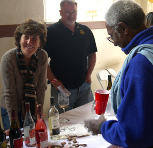 Karen Steinwachs, winemaker for Buttonwood Farm Winery, with Al Harry tasting, right