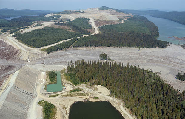 Damage from a tailings pond breach is seen near Likely, B.C., Tuesday, August 5, 2014. A tailings pond that breached Monday, releasing a slurry of contaminated water and mine waste into several central British Columbia waterways, had been growing at an unsustainable rate, an environmental consultant says. THE CANADIAN PRESS/Jonathan Hayward ORG XMIT: JOHV201