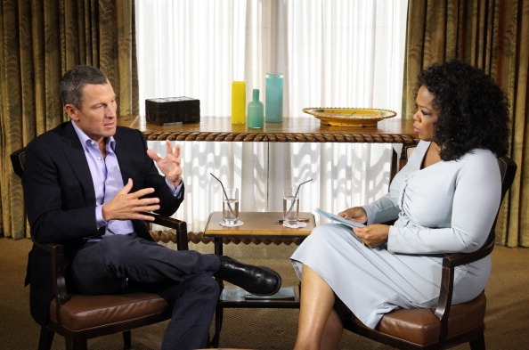 Lance Armstrong, left, with Oprah Winfrey in January 2013 // Getty Images