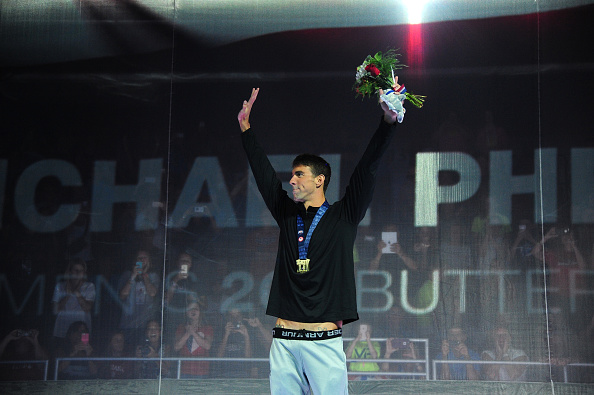 Phelps back on the victory stand // Getty Images 