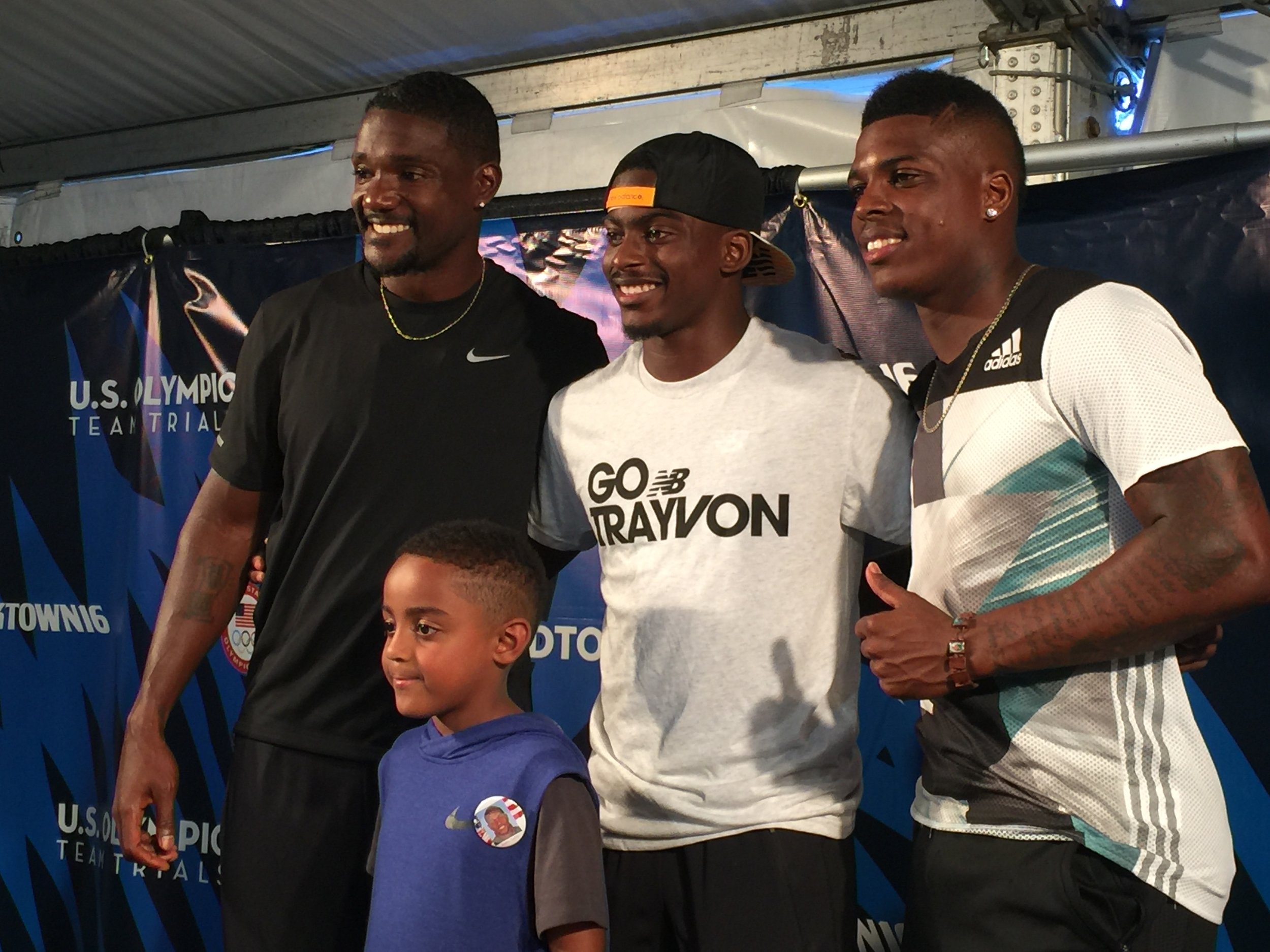 Justin and Jace Gatlin, Trayvon Bromell and Marvin Bracy after the race 