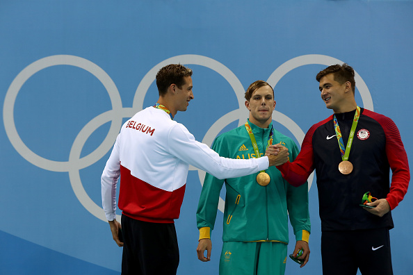 After the men's 100 free: silver medalist Pieter Timmers, left, congratulates bronze medalist Nathan Adrian with winner Kyle Chalmers in the middle // Getty Images 