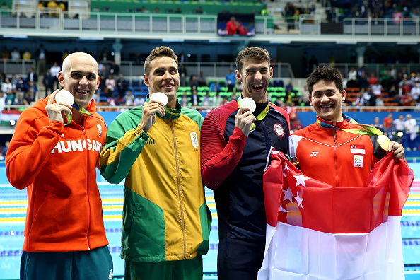 From left, 100 fly silver medalists Laszlo Cseh of Hungary, Chad le Clos of South Africa and Michael Phelps, with gold medalist Joe Schooling of Singapore // Getty Images 