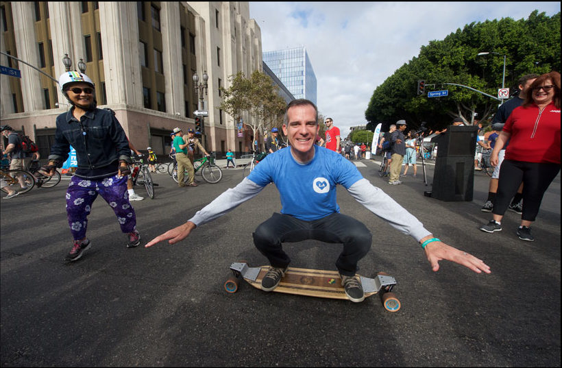 Mayor Eric Garcetti at a recent event, the LA Times building in the background // Gary Leonard