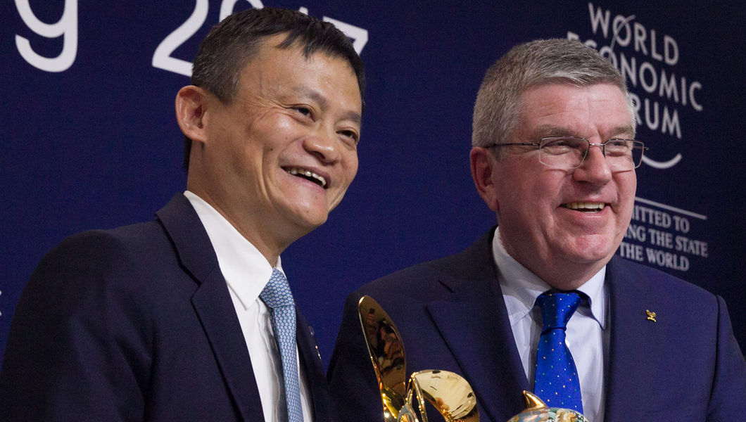 Alibaba Group founder and executive chairman Jack Ma and IOC president Thomas Bach celebrating in Davos // IOC