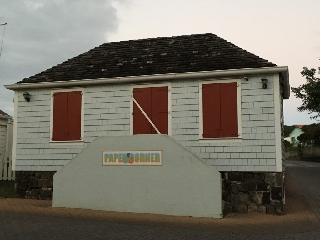 In the 18th-century this building served as the local rum shop. Today, it's the local office supply shop. Many buildings in Statia took advantage of space so that the widest part of the building fronted the street.