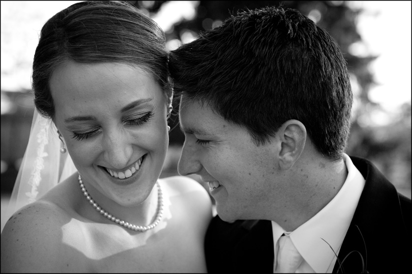 Black and white portrait of smiling married couple at Muhlenberg College in Allentown, PA