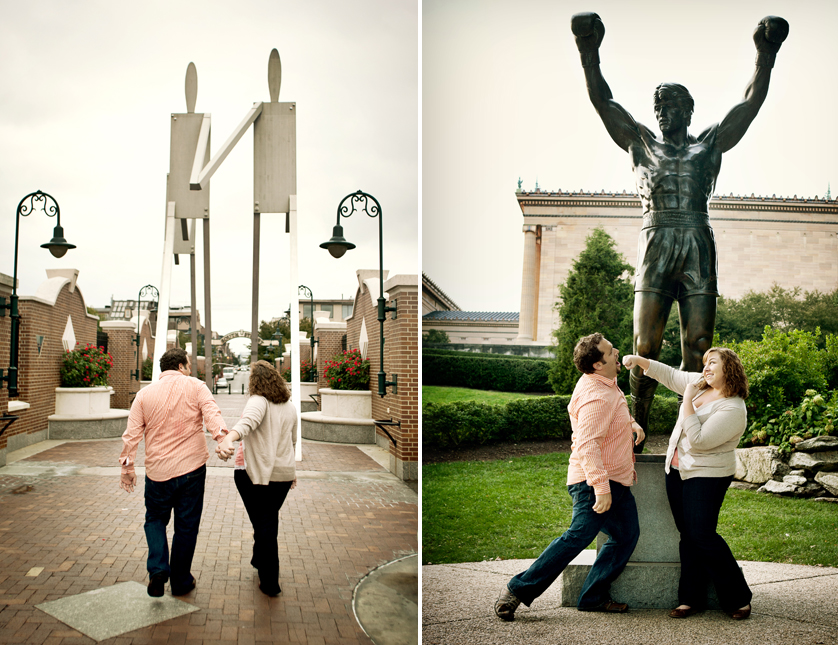 Couple mimicking South Street statue and mock knock-out in front of Rocky Statue in Philadelphia, PA