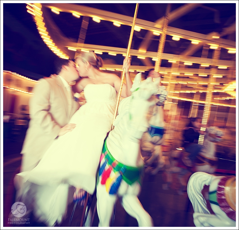 Bride and Groom on Carousel in Ocean City