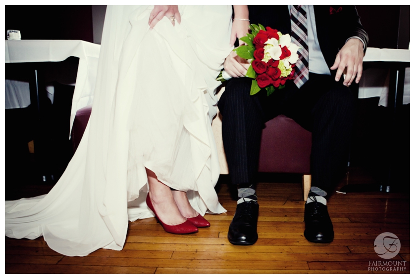 bride's red wedding shoes, groom's argyle socks