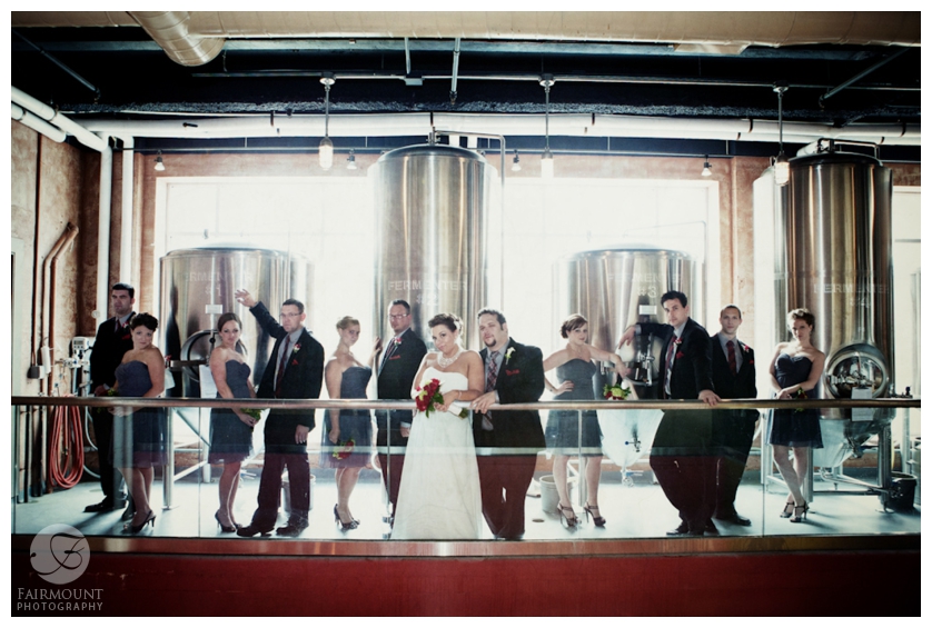 Bridal party portrait in front of beer casks at Brew Works in Allentown, PA