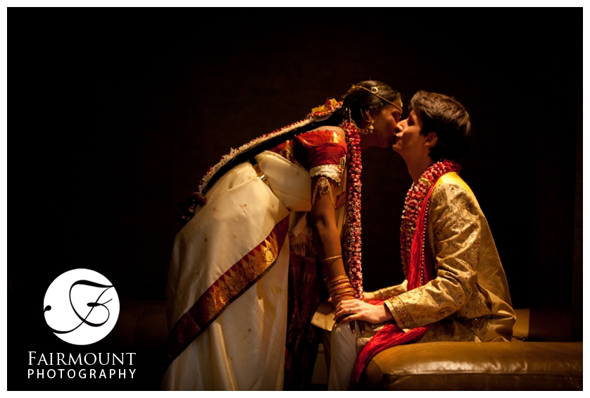 Indian Bride and Caucasian Groom kiss